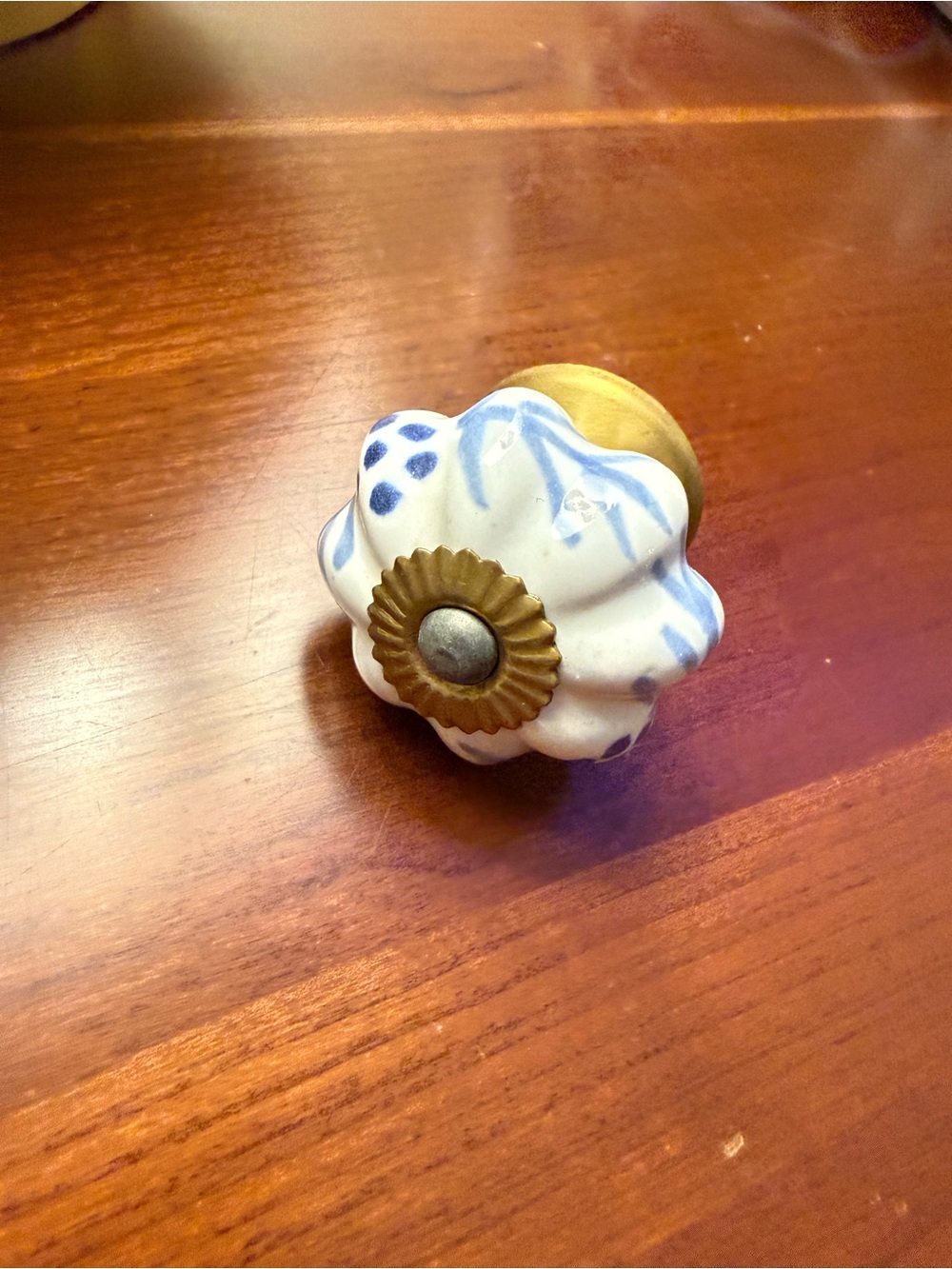 Anthropologie White Ceramic Floral Drawer Knob with Blue Hand-Painted Detail
